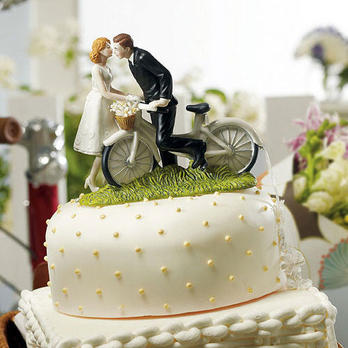 A Kiss Above Bicycle Bride and Groom Couple Figurine