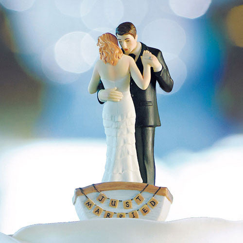 Row Away Wedding Couple in Rowboat Figurine